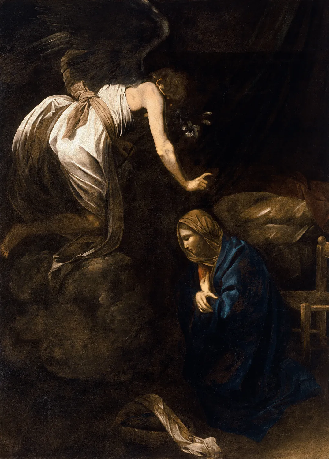 A dark painting. An angel in pale cloth leans down from above and points. Below, a woman in dark blue kneels with her head bowed.