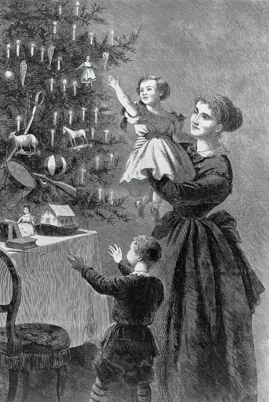 A wood engraving of a mother lifting a small child toward a tall candlelit tree hung with ornaments, while an older child reaches up.